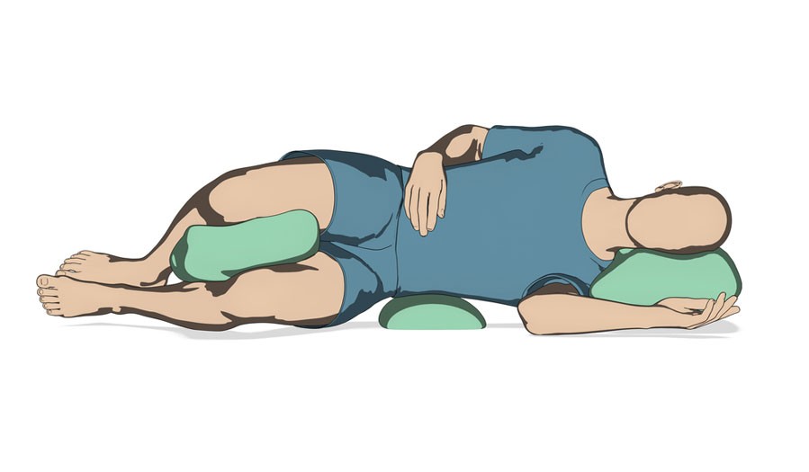 image of fetal position sleeping posture for someone with lower back sciatica pain