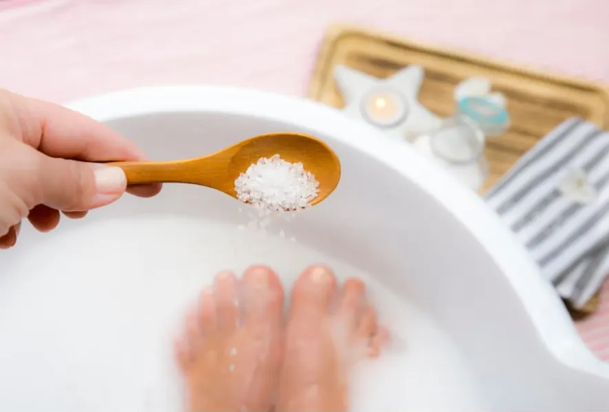 picture of epsom salts in a bath to help low back pain