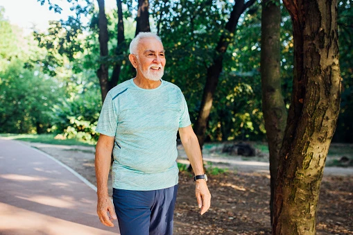 middle aged man walking outside to relieve sciatica pain