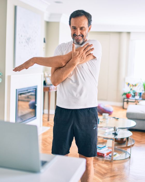 Middle,Age,Man,With,Beard,Training,And,Stretching,Doing,Exercise